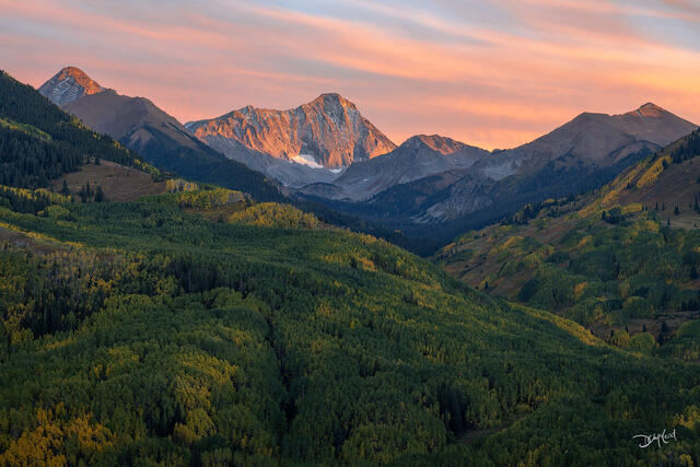 Capitol Peak at sunset with autumn clouds in Colorado, USA.