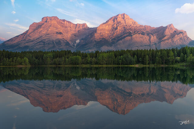 Mount Kidd reflected in Wedge Pond in Kananaskis, Alberta.