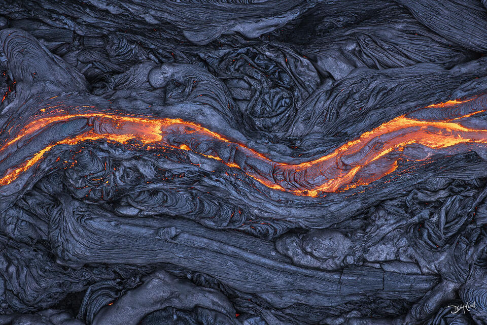 Lava river moving through older rock in Hawaii.