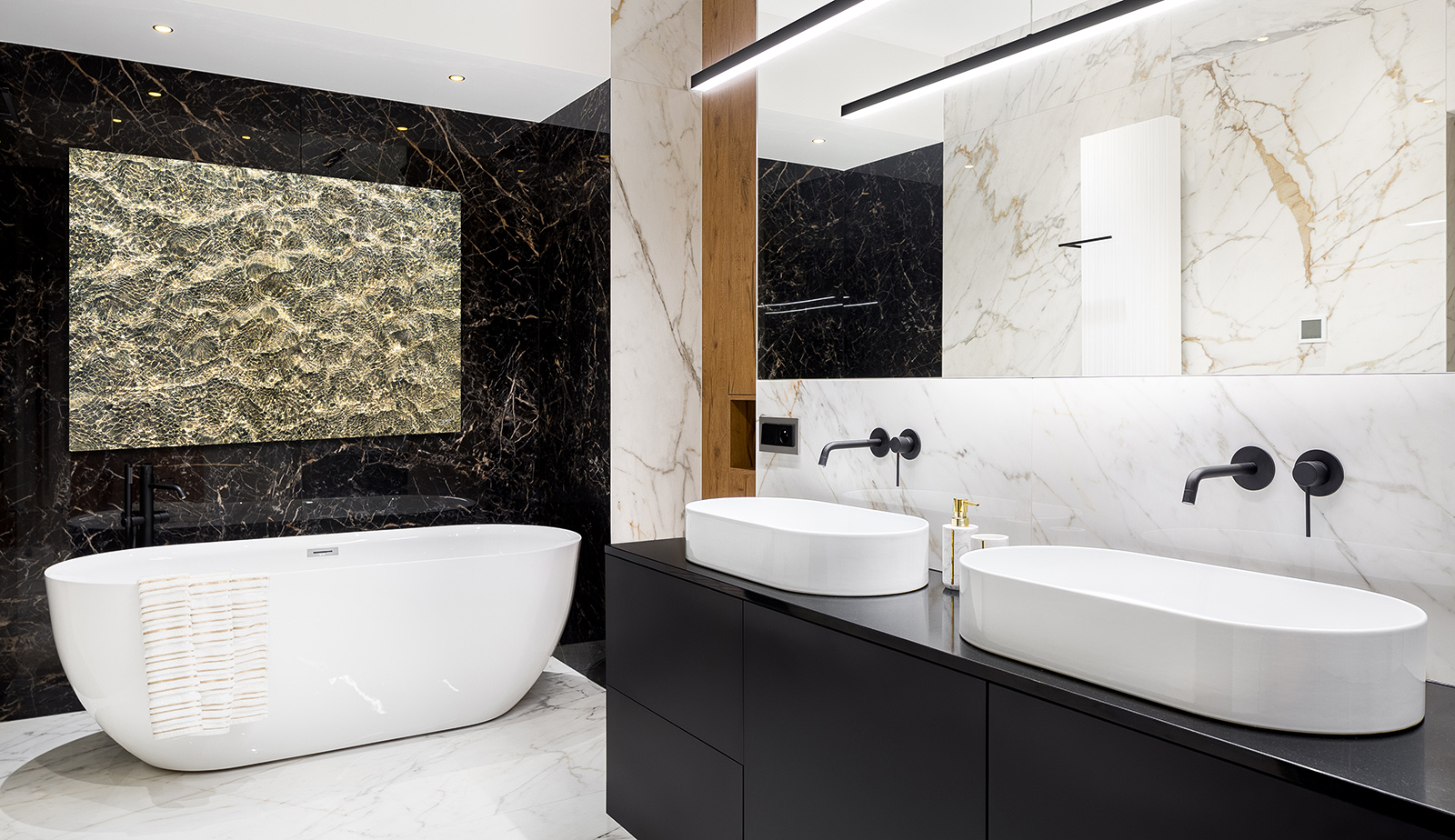 Abstract photo wall art of sand and water blending with golden marble bathroom décor.