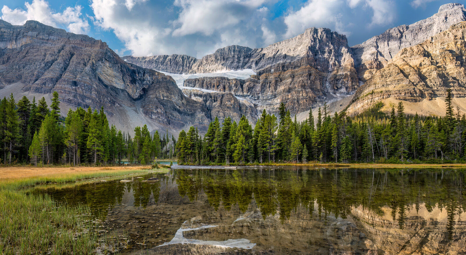 Closeup view of Crowfoot Glacier and Mountain reflected in Bow Lake, Icefields Parkway, Banff, Alberta.