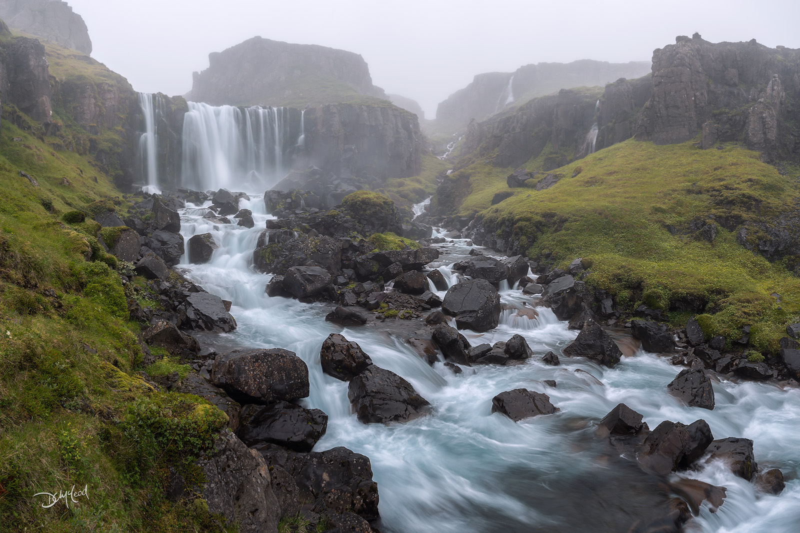 Dream II Foggy waterfall valley in Iceland.