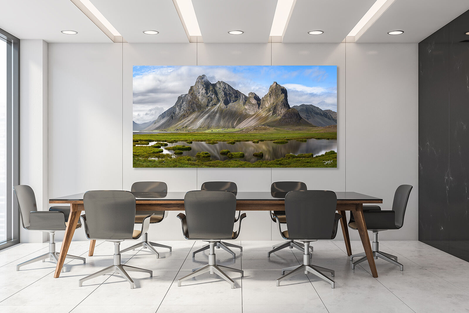 Large fine art mountain photo of Eystrahorn in Iceland showcased in a modern boardroom office.