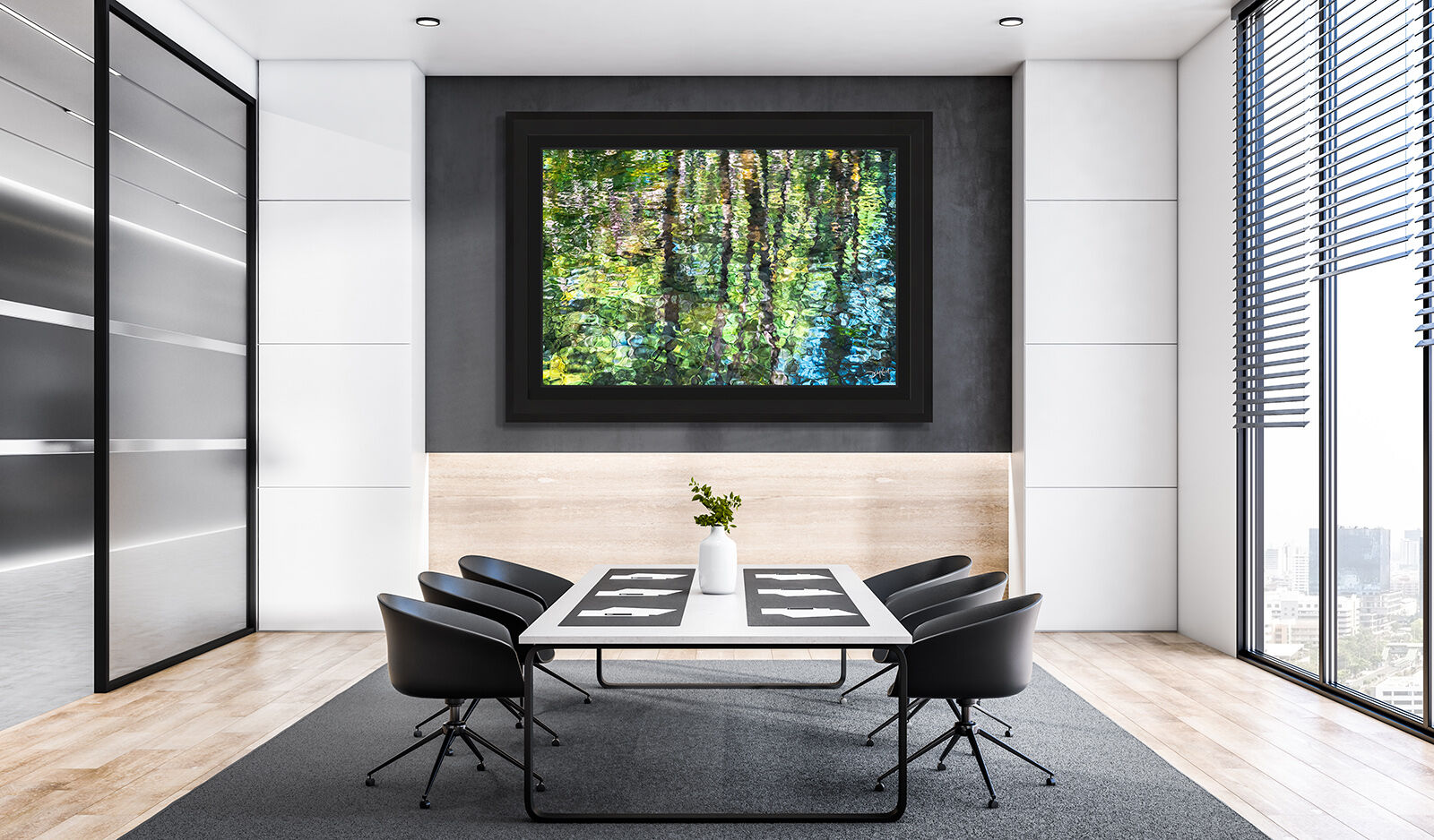 An abstract water reflection print framed with a Roma Ramino custom frame hangs in a minimalist upscale dining room.