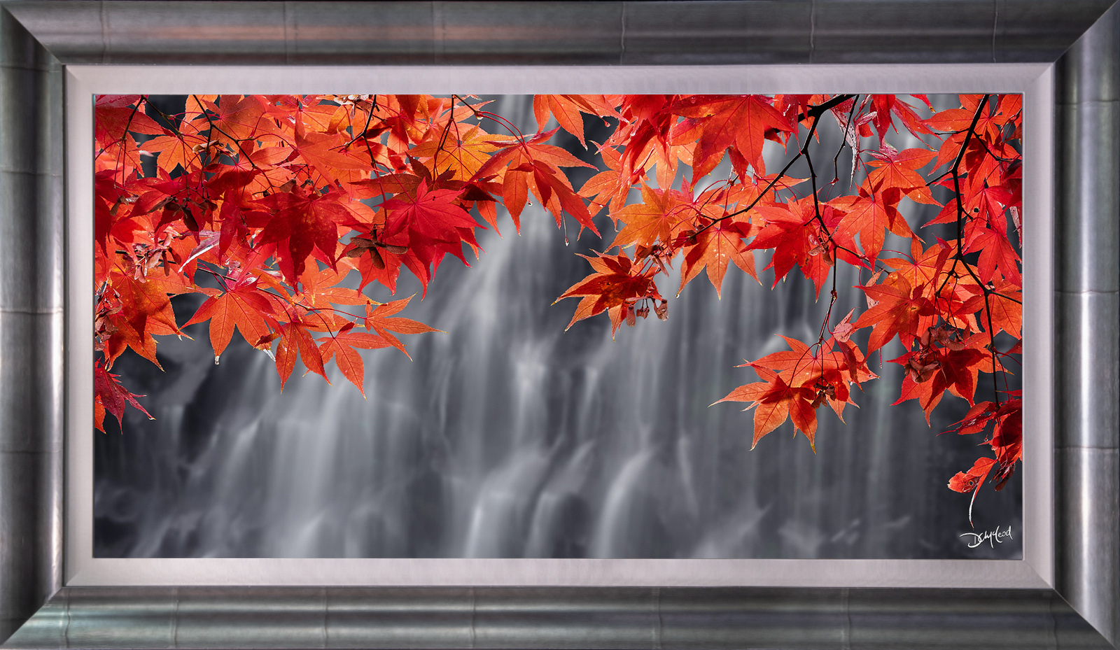 Fine art acrylic framed photography print of crimson maple leaves over a cascading waterfall.