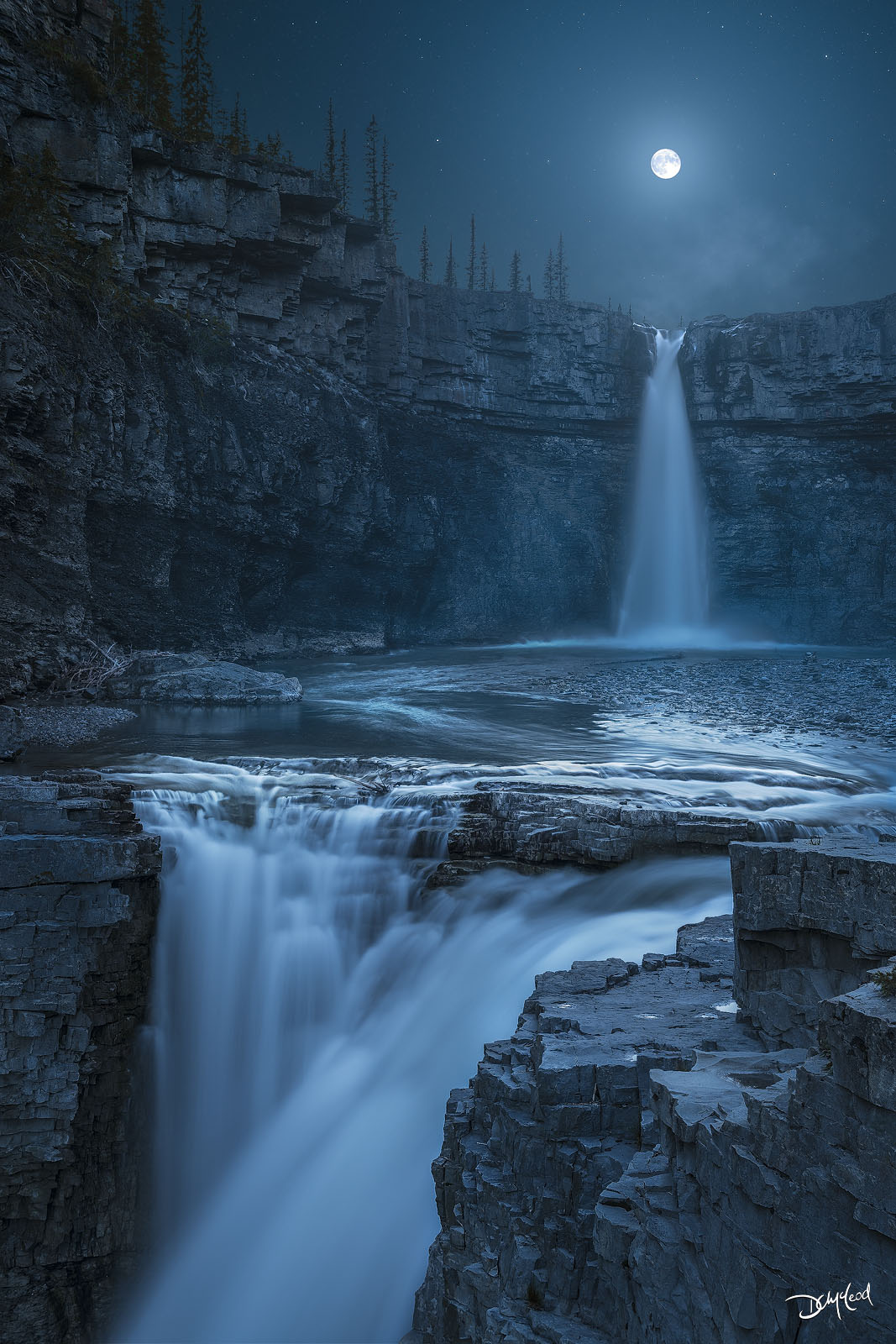 Crescent Falls waterfall in Alberta at night with moonlight, fine art landscape photography print.