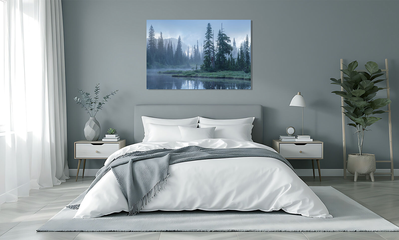 Foggy lake landscape print displayed in a minimalist bedroom with soft grey tones and simple clean design.