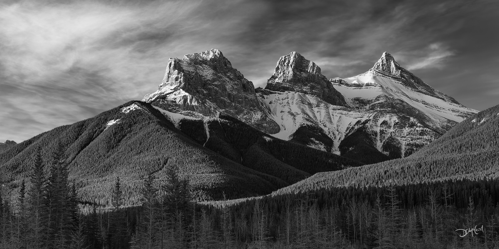 Three Sisters mountain Canmore at sunrise black and white.